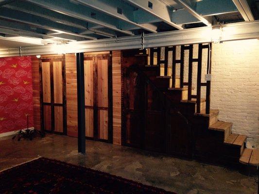 Basement  reclaimed wood cabinets and stairs.