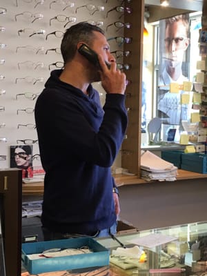 Oleg with a client on the phone