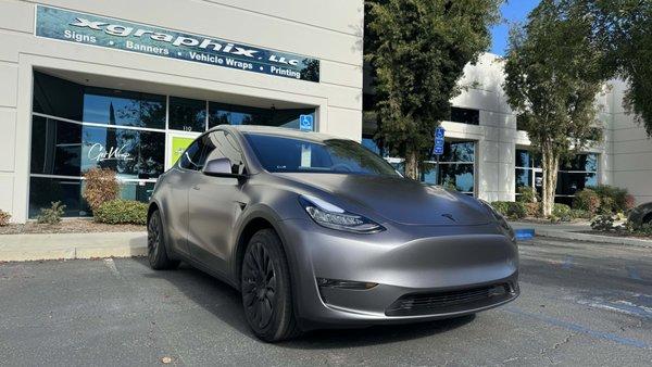 Full wrap on Tesla model Y with 3M Satin Dark Grey