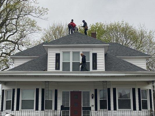 Finishing touches being done on this roof.