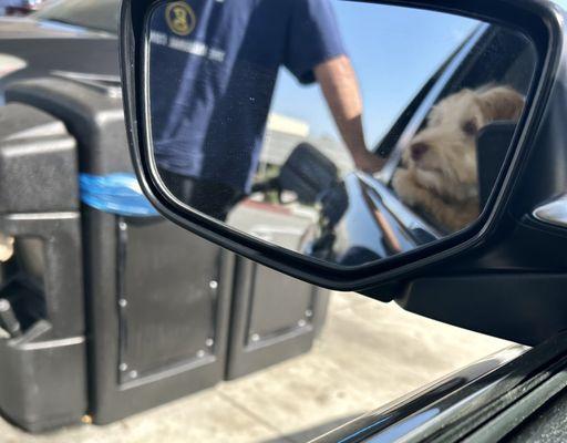 Watching Dad pump Gas