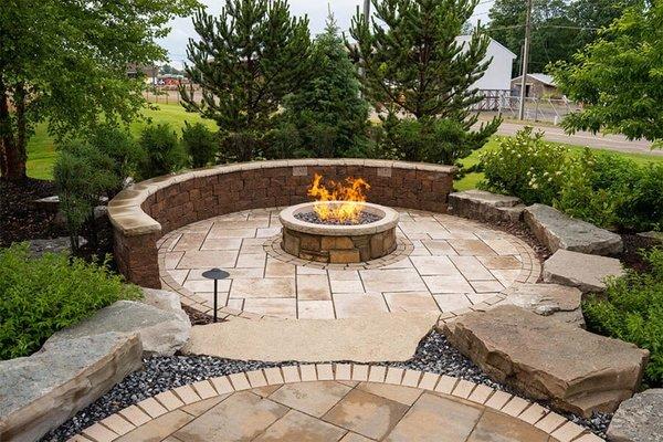 Firepit with seating walls and paver patio