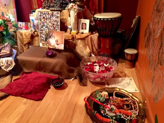 Setting up for a puja to honor swami satchidananda