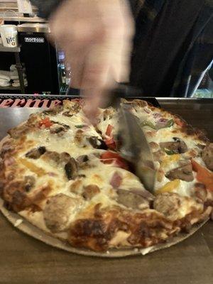 Prohibition thin crust pizza freshly cut right in front of you!