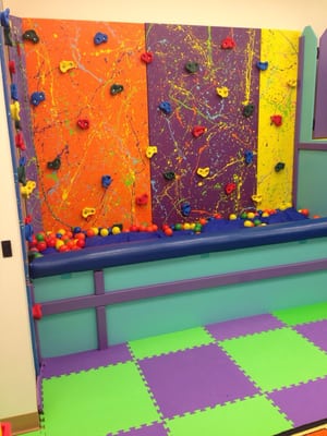 Ball pit with rock climbing wall