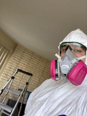 Technician protected and prepared to remove mold