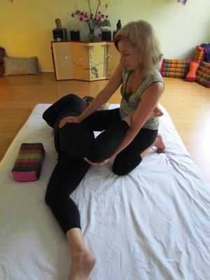 Thai massage stretches and lengthens the body, gently increasing flexibility