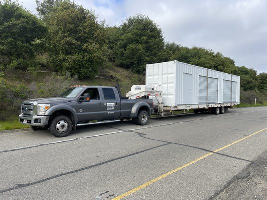 Transporting a shipping container