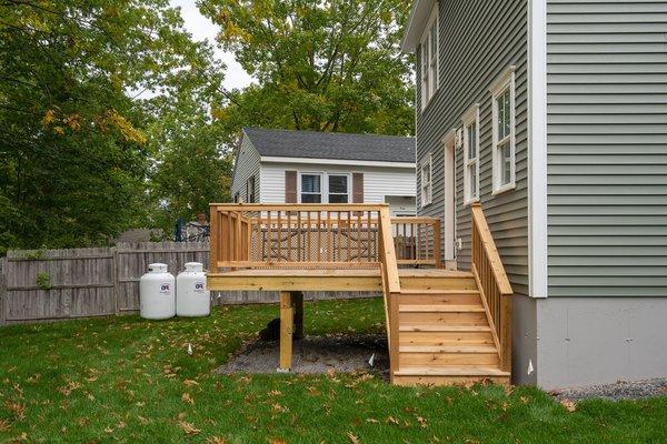 Beautiful cedar deck provides a private space to hang out.