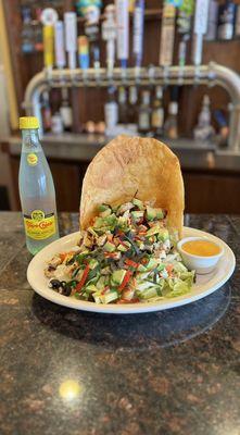 Enjoy our chicken avocado salad along with a refreshing Topo Chico