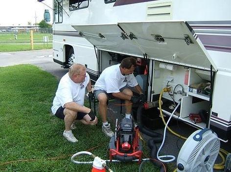 Hydro jetting a motorhome, to clean the holding tanks to like new condition.