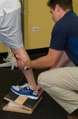 Dr. Dukes taking a patient through some three dimensional rehab on the ankle/ foot.