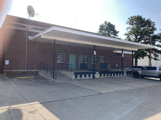 view of rear of post office building