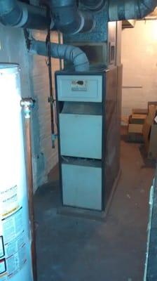 Old 80% furnace before new furnace replacement.