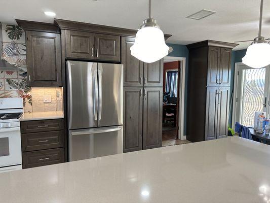 Cabinets around the refrigerator & additional storage