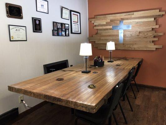 Our reclaimed bowing alley table and reclaimed flooring wall feature.