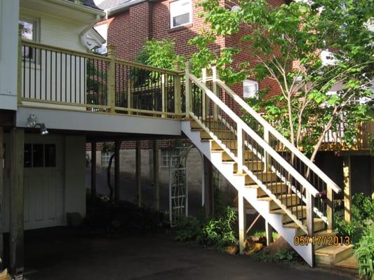 We changed the old decking boards and built a new railing system with using treated lumber and round aluminum balusters also ...