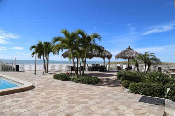 Sandy Shores at John's Pass Direct Beach Tiki Huts & Lounges