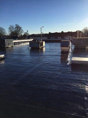 This is a rubberized coating seeps into any openings causing roof leaks  applied on all flat roofs drys up within 24 hours.