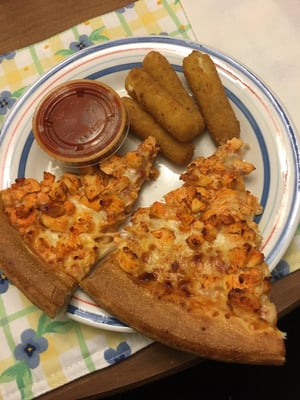 Buffalo chicken pizza and mozzarella sticks.