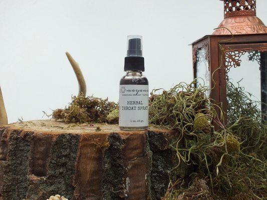 Herbal throat spray. Glycerin, wild cherry bark, marshmallow, licorice and osha roots, rose hips, and more blended together!