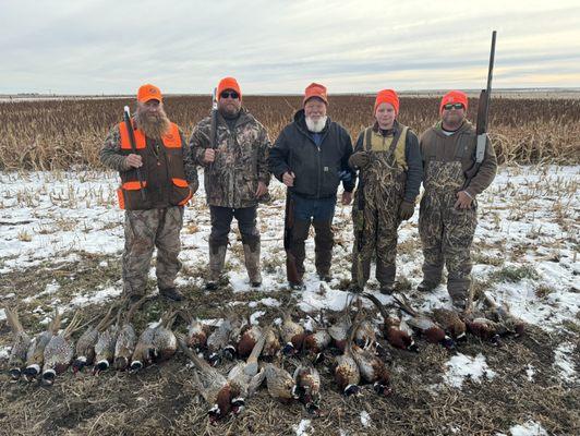 Three generations on a pheasant hunt. Opa, sons, son-in-law and grandson.