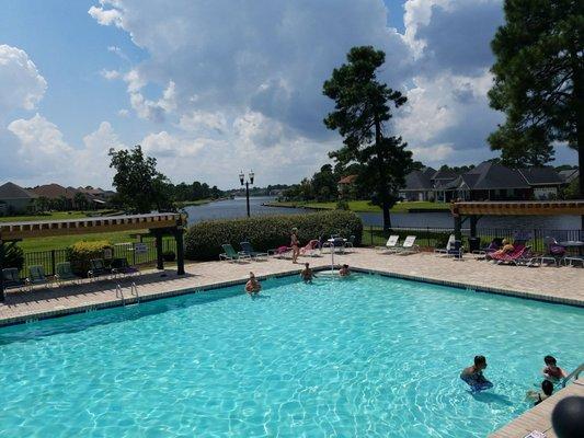 Pool surrounded by lake which snakes through development.