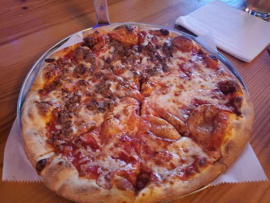 Half sausage 12" pizza.