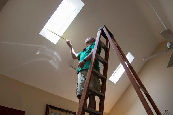 Taking measurements for new WASCO E-Class skylights.