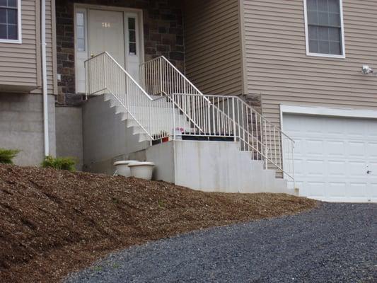 Precast stair and rail installation.