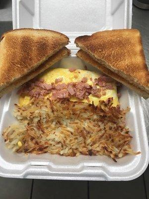 We now offer breakfast. This is our Mark Jr.'s omelet! Ham and American cheese omelet, hash browns or fried red potatoes and Toast!