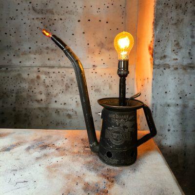 Upcycled lamp from an oil can.