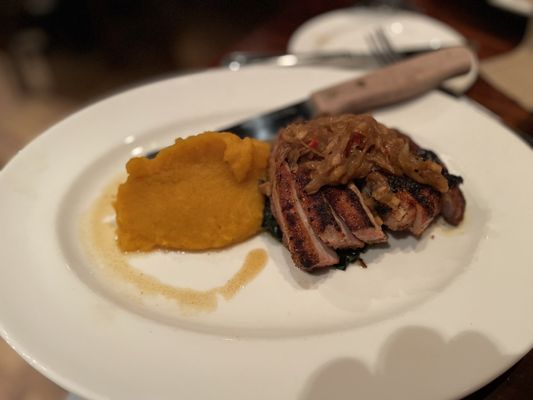 "Blackened Pork Chop" (Vermont maple butternut squash, cider-braised kale, roasted fennel and Granny Smith relish)