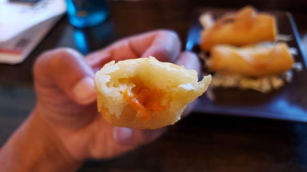 Interior of harumaki ($5). Terrible. Smelled weird. Buttery and sour flavor. Gave up after two bites.