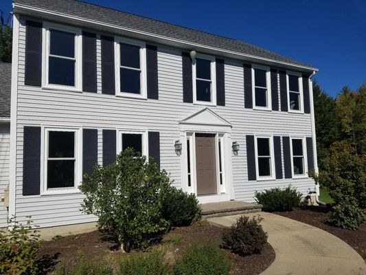 Replacement windows with azek trim kits and new front entrance.