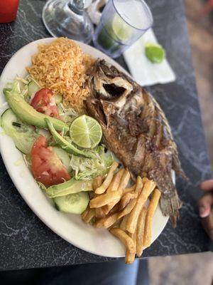 Mojarra Frita. Perfectly cooked. Portions were great, Mexican rice. French fries and a side salad Everything was amazing!