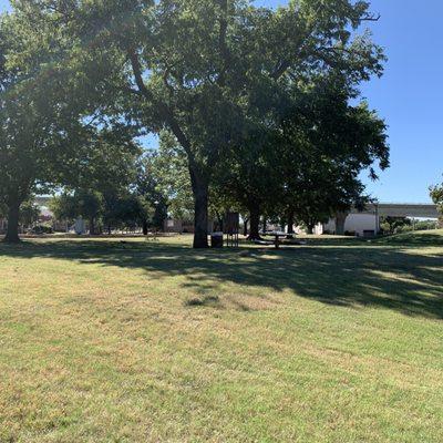 Grassy fields in park.