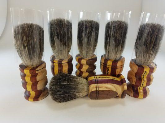 Badger hair shaving brushes with a segmented wood handle/actual wood colors too. $38.00