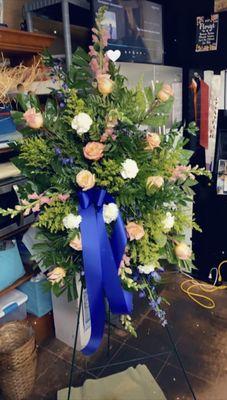 Standing easel floral arrangement for my cousin's funeral.