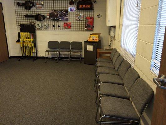 Waiting room with beverages and snacks in the corner