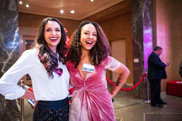 two smiling professionals at an awards ceremony in Portland Oregon