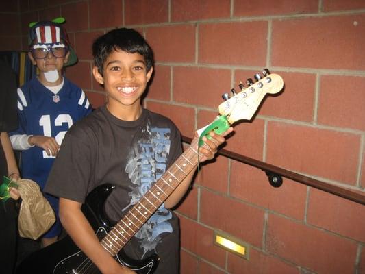 Deven played Stairway at a school talent show, he was AWESOME! YAY Deven!!