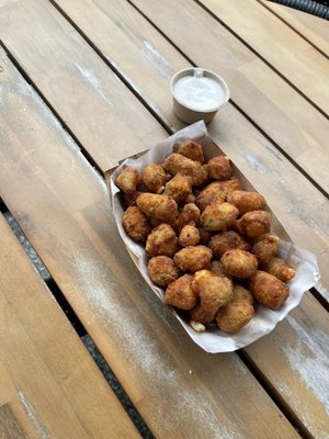 Fried garlic cheese curds with ranch dipping sauce