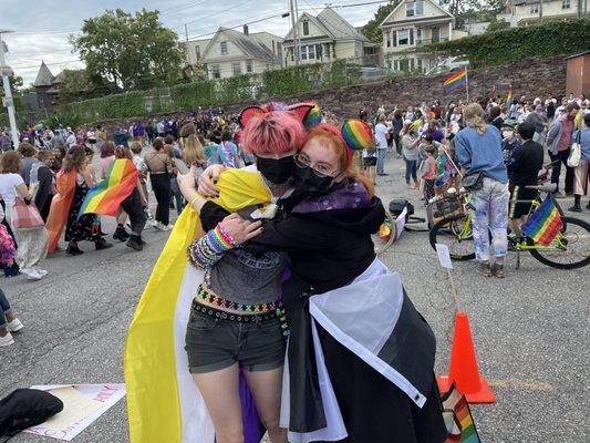 Youth hugging at Pride 2021