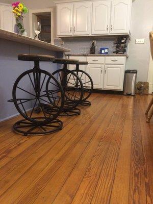 Watch the chef create perched on a bicycle stool