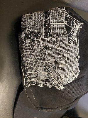 Map of SF printed on the side of the cap.