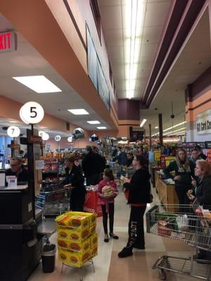 Long lines without enough cashiers or help bagging.