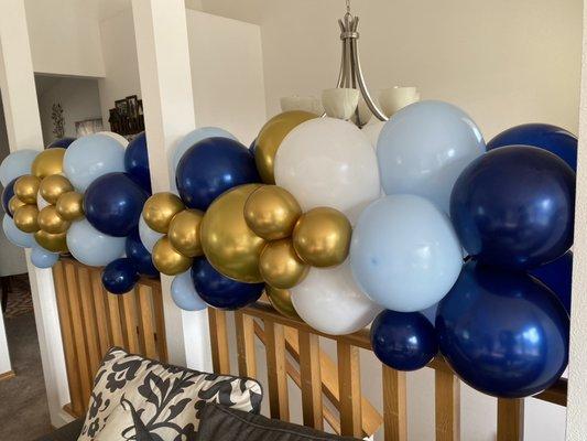 Birthday stair rail balloon columns