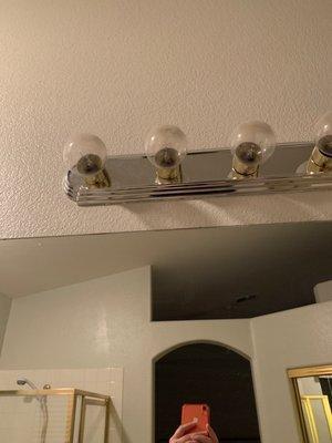 Dust on the bathroom light bulbs.