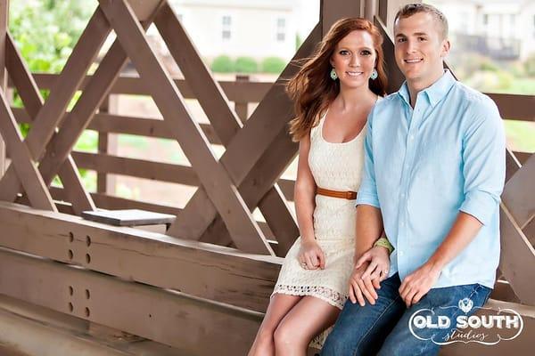 Engagement Shoot, hiding from the rain storm under a bridge (hair and make up still perfect)